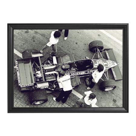 Framed black-and-white photo of Ligier Renault pit crew working on Formula 1 car.